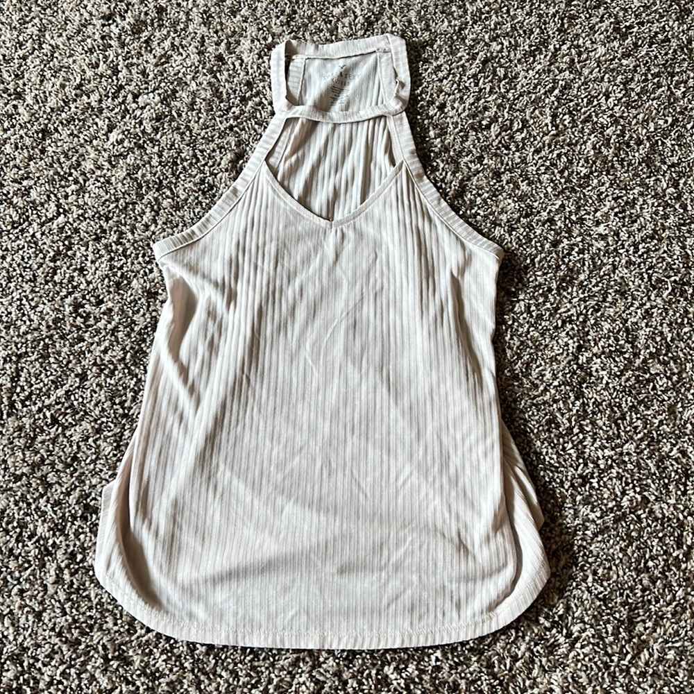 American Eagle cream top with open chest size M